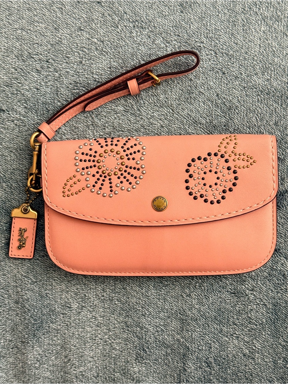 Coach 1941 peony tea rose rivets studded clutch